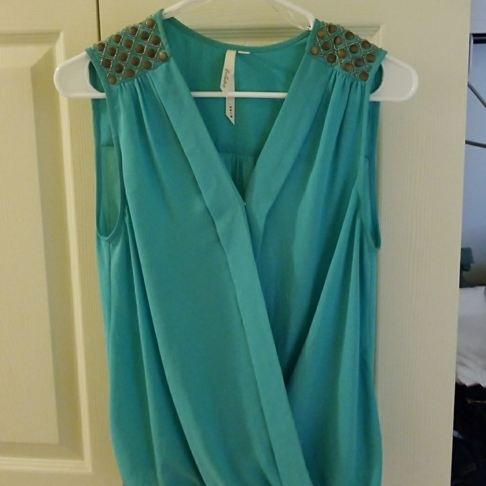 Teal sleeveless top with studded detail